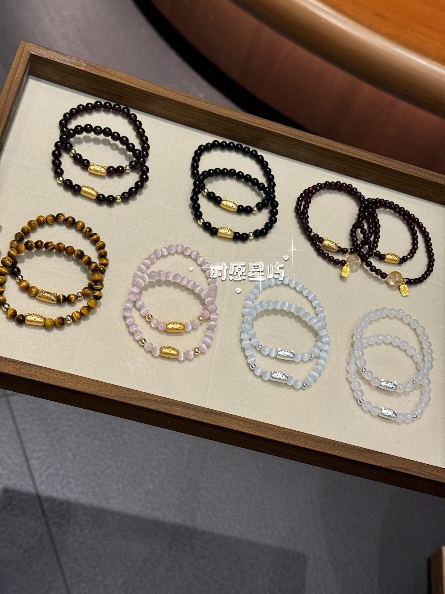 Baguette Dog Family · Cat’s Eye Pink Solitaire Bracelet